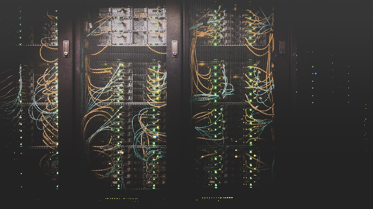 Server racks in a data center. The infrastructure doesn't care who breaks it.